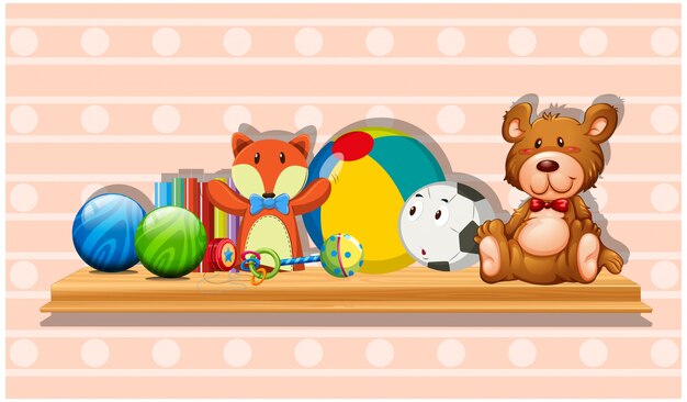 Many cute toys on wooden board