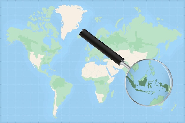 Карта мира с увеличительным стеклом на карте индонезии. Premium векторы