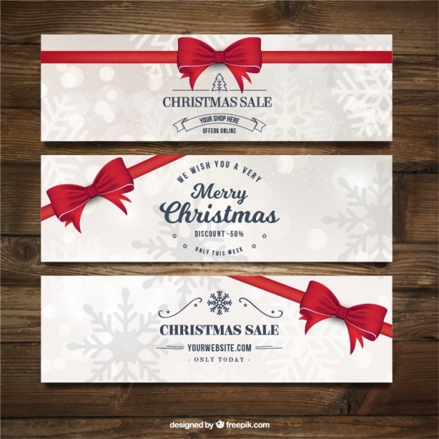 Free vector merry christmas banners with red ribbons and snowflakes