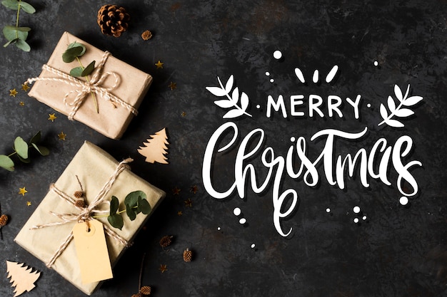 Free vector merry christmas lettering on christmas photo