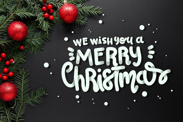 Free vector merry christmas lettering on christmas photo