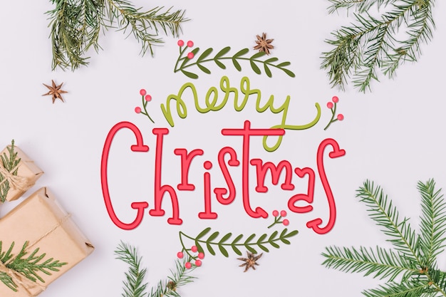 Free vector merry christmas lettering on christmas photo