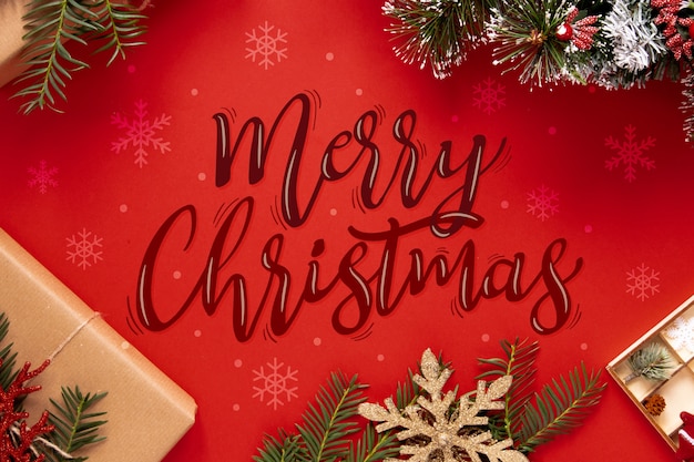 Free vector merry christmas lettering on christmas photo