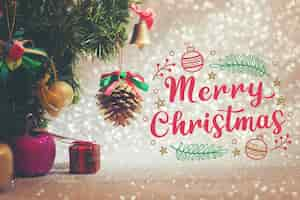 Free vector merry christmas lettering on christmas photo