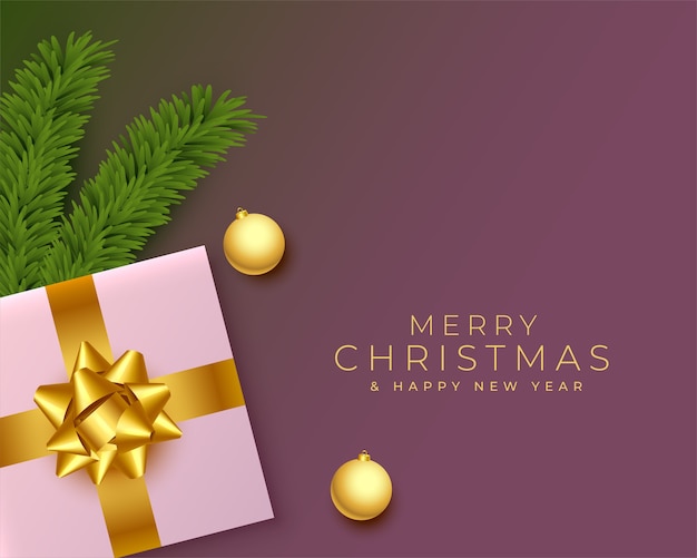 Merry christmas realistic greeting with gifts and pine tree leaves