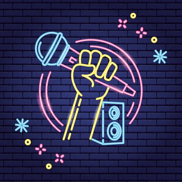 Microphone and speaker in neon style over purple
