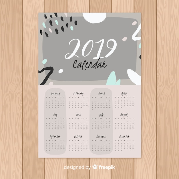 Free vector modern 2019 calendar template with abstract shapes