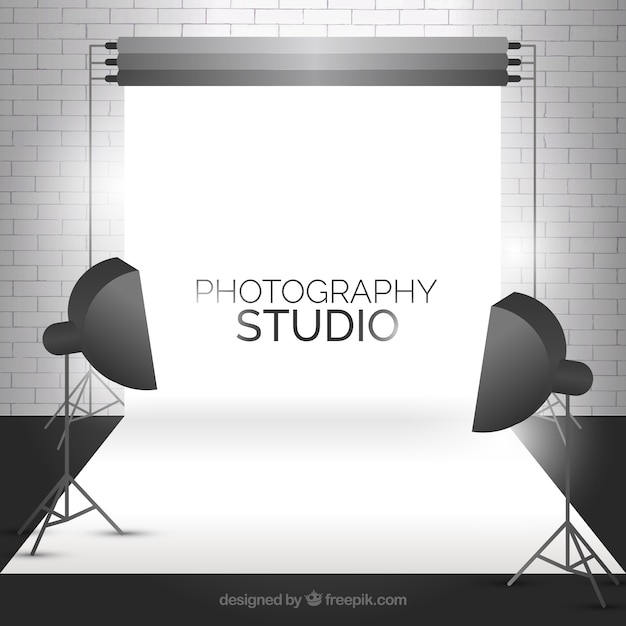 Modern photo studio with a bricks wall