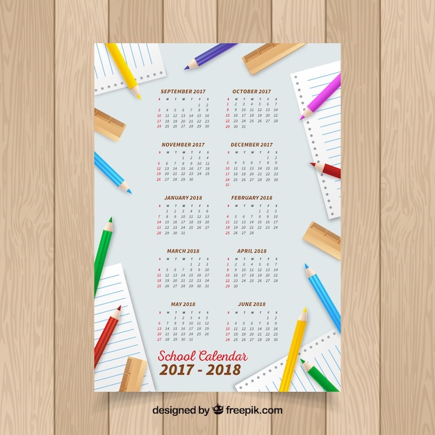 Free vector modern school calendar with colorful pencils