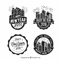 Free vector monochrome badges collection for new year