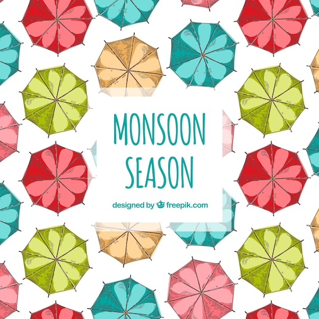 Free vector monsoon season background with umbrellas