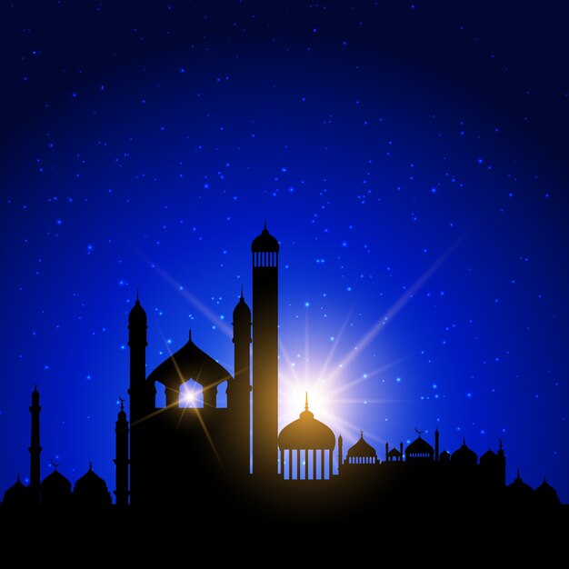 Силуэты мечети против ночного неба