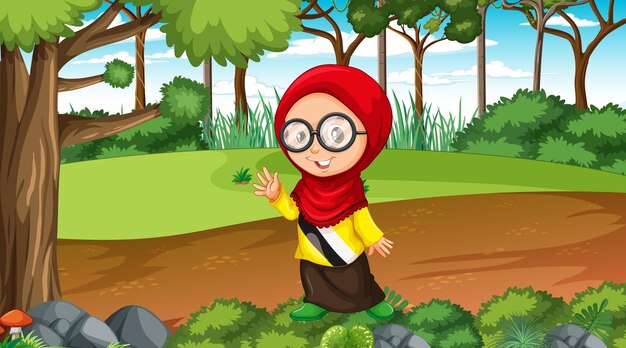 イスラム教徒の少女は森のシーンで伝統的な服を着ています