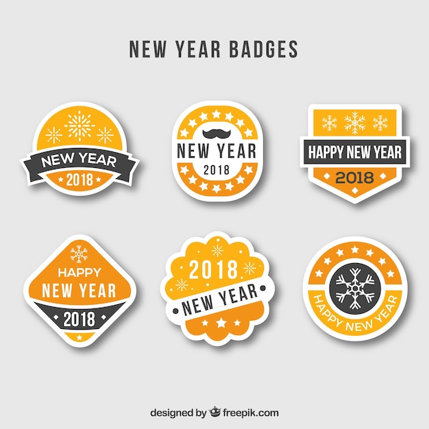 Free vector new year badges in yellow, orange and grey