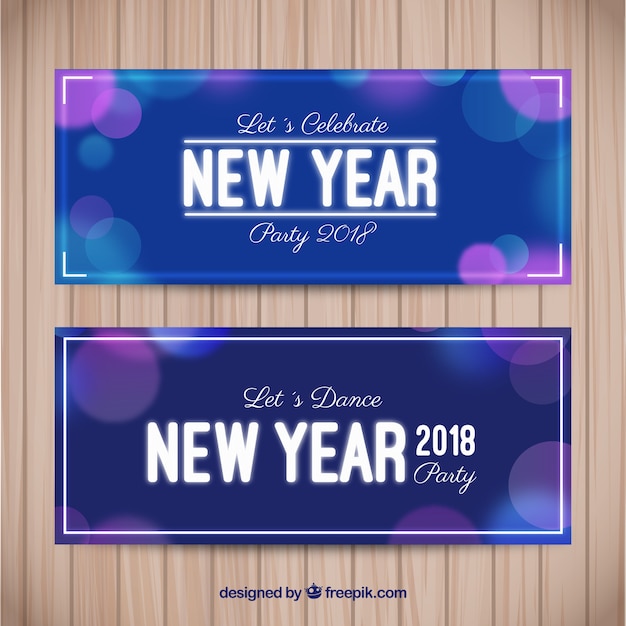 Free vector new year bokeh banners