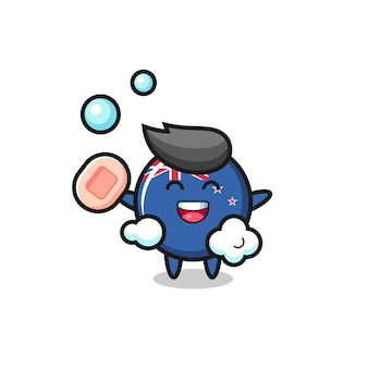 New zealand flag badge character is bathing while holding soap Premium Vector