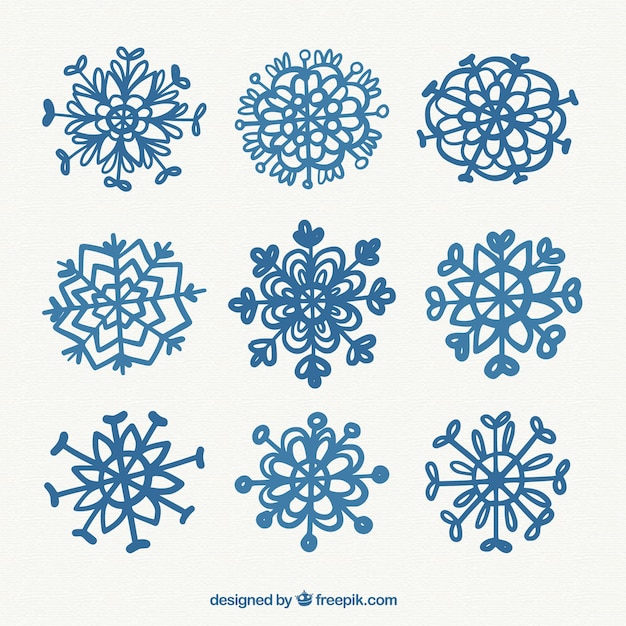 Free vector nice collection of hand-drawn snowflakes