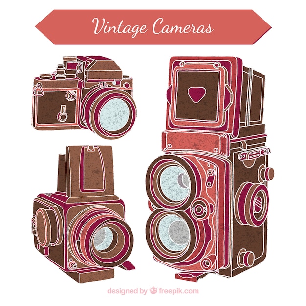 Free vector old photo cameras sketches