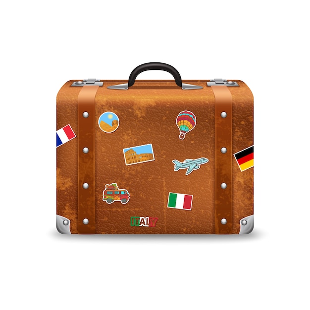 Free vector old style voyage suitcase with travel stickers