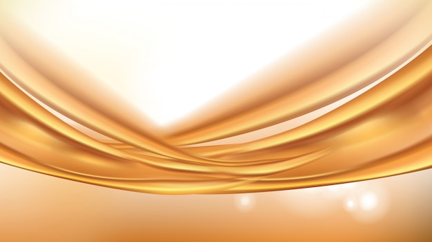 オレンジ色の黄金の流れる液体の抽象的な背景