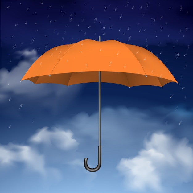 雲の背景で空にオレンジ色の傘