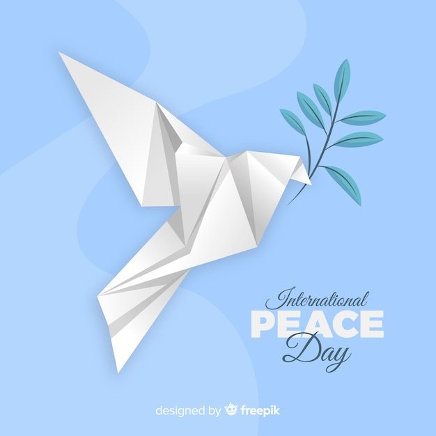 Free vector origami peace day background with dove