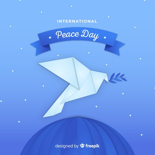 Origami peace day background with dove