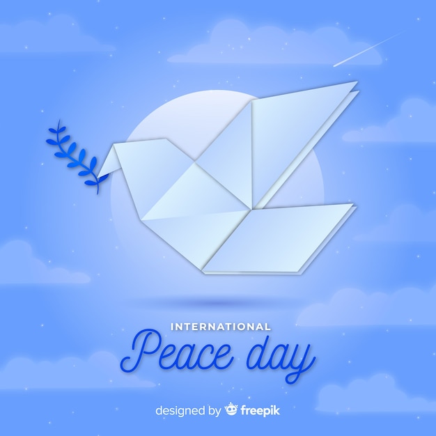 Free vector origami peace day background with dove