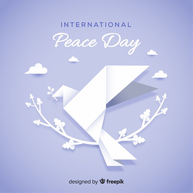 Origami peace day background with dove