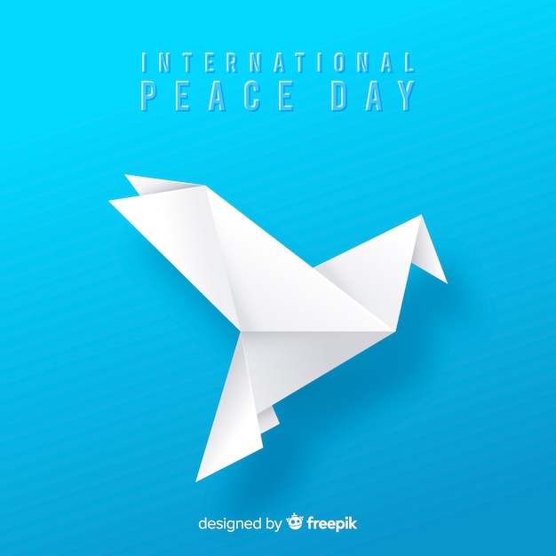 Origami peace day background with dove