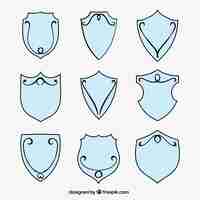 Free vector ornamental set of hand drawn heraldic shields