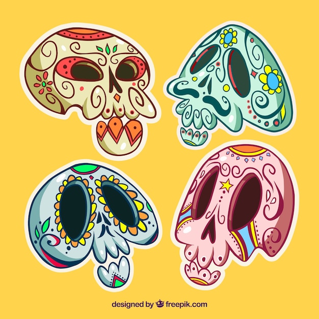 Pack of four hand drawn mexican skulls