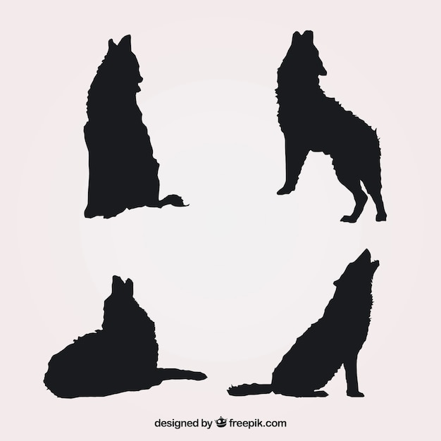 Pack of four silhouettes of wolves