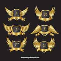 Free vector pack of golden crests with wings