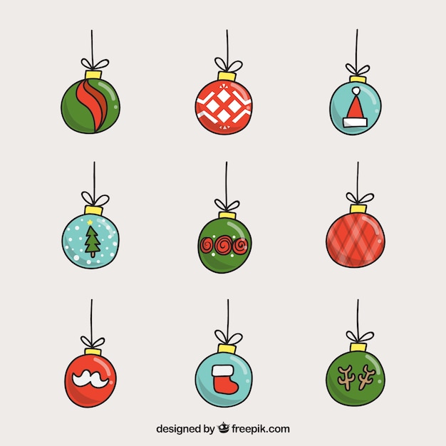 Free vector pack of hand-drawn balls with christmas elements