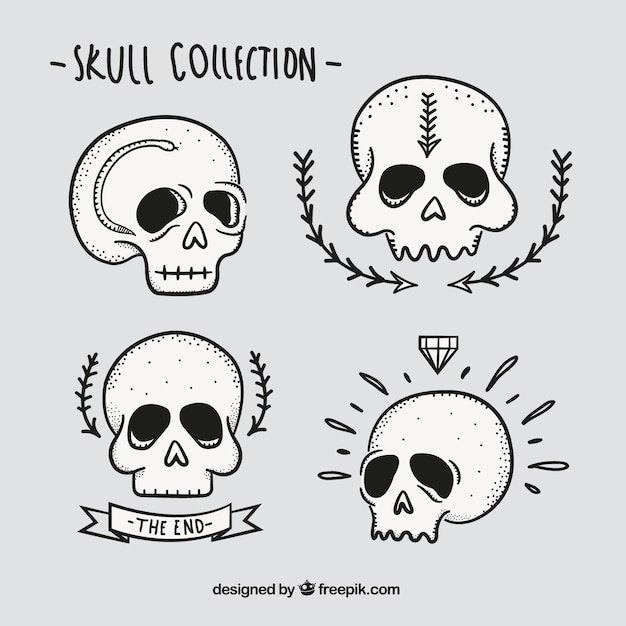 Free vector pack of hand drawn skulls