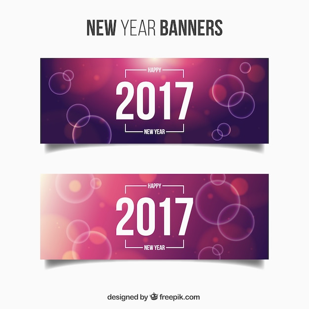 Vettore gratuito confezione di nuovi banner anno con sfondi viola e cerchi luminosi