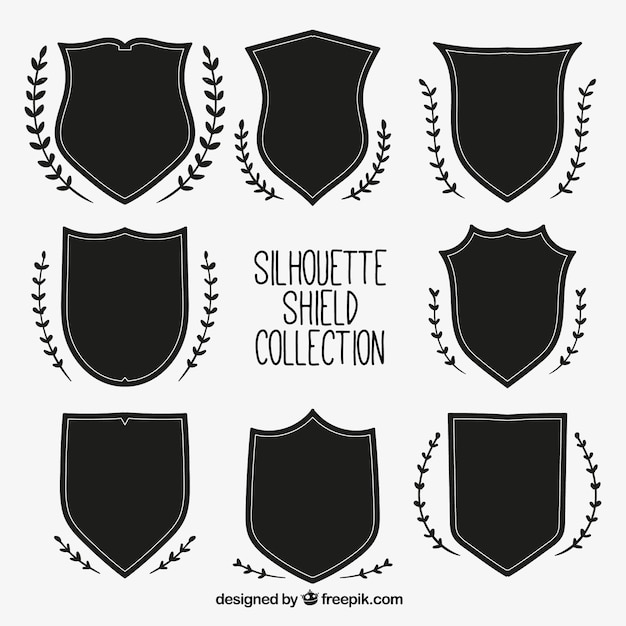 Free vector pack of shields silhouettes with natural ornaments