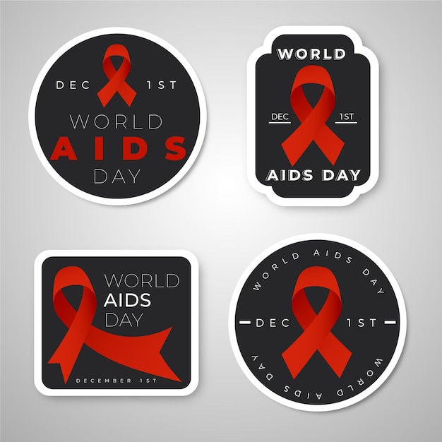 Vettore gratuito confezione di badge per la giornata mondiale contro l'aids con nastri rossi