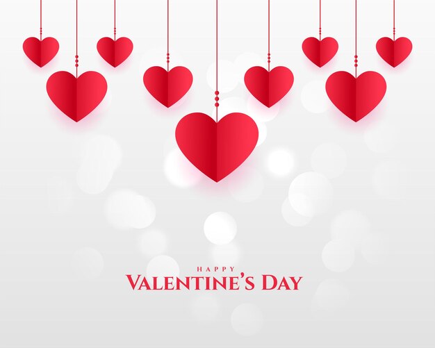 paper style hanging hearts valentines day bokeh background