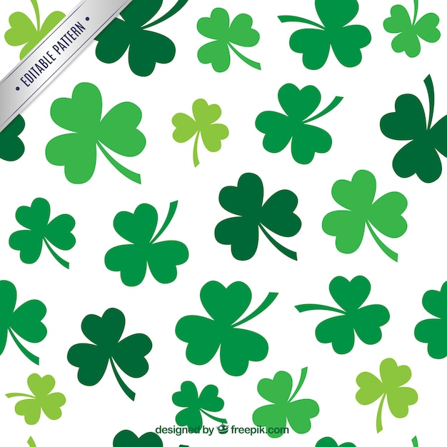 Free vector pattern with shamrocks