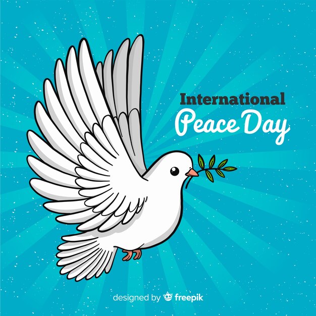 手で描かれた鳩と平和の日の背景