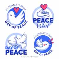 Free vector peace day badge collection with flat design