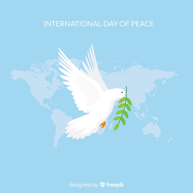 平らな白い鳩と平和の日の構成