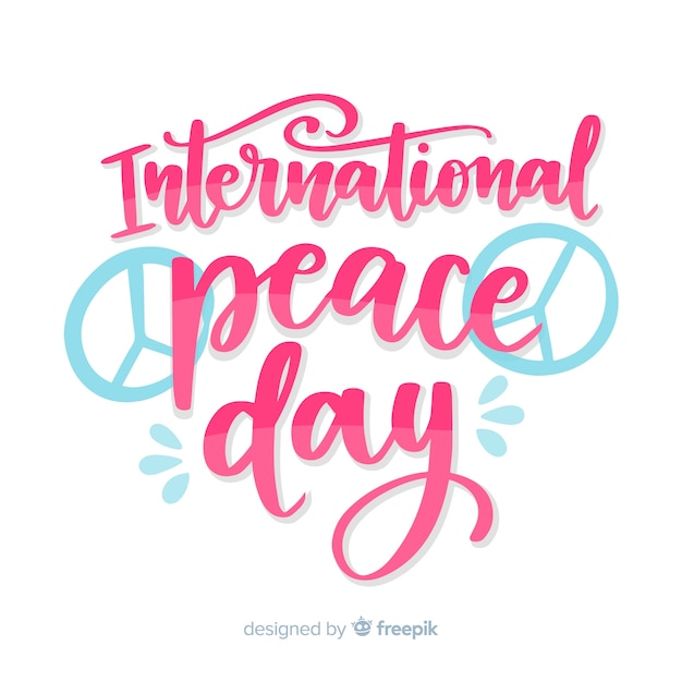 Free vector peace day concept with lettering