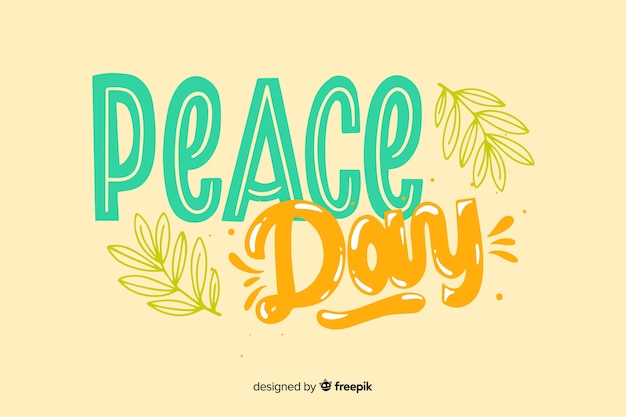 Free vector peace day concept with lettering