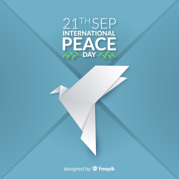 Free vector peace day concept with origami dove