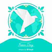 Free vector peace day concept with origami dove