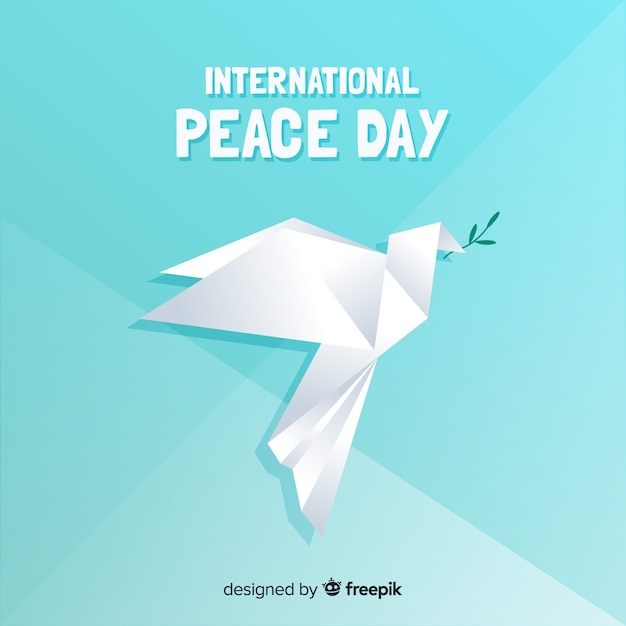 Free vector peace day concept with origami dove