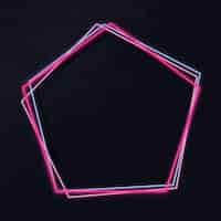 Free vector pentagon neon frame on a dark background